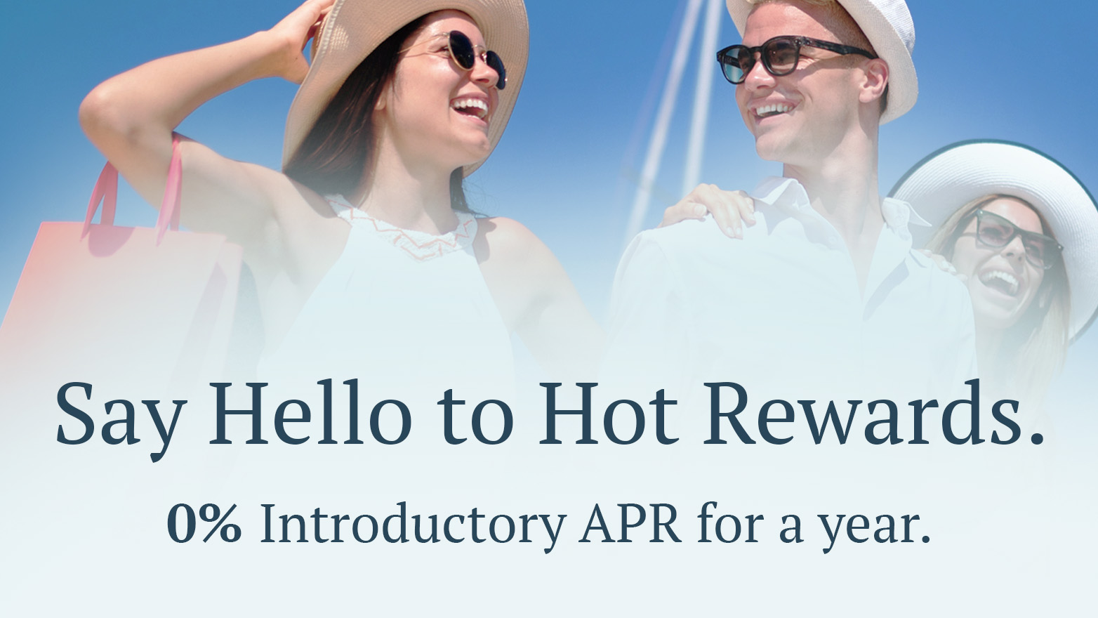 Two people with hats and sunglasses. Text: "Say Hello to Hot Rewards. 0% Introductory APR for a year."
