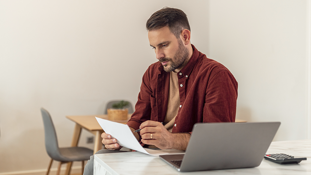 Man reviewing financial documents