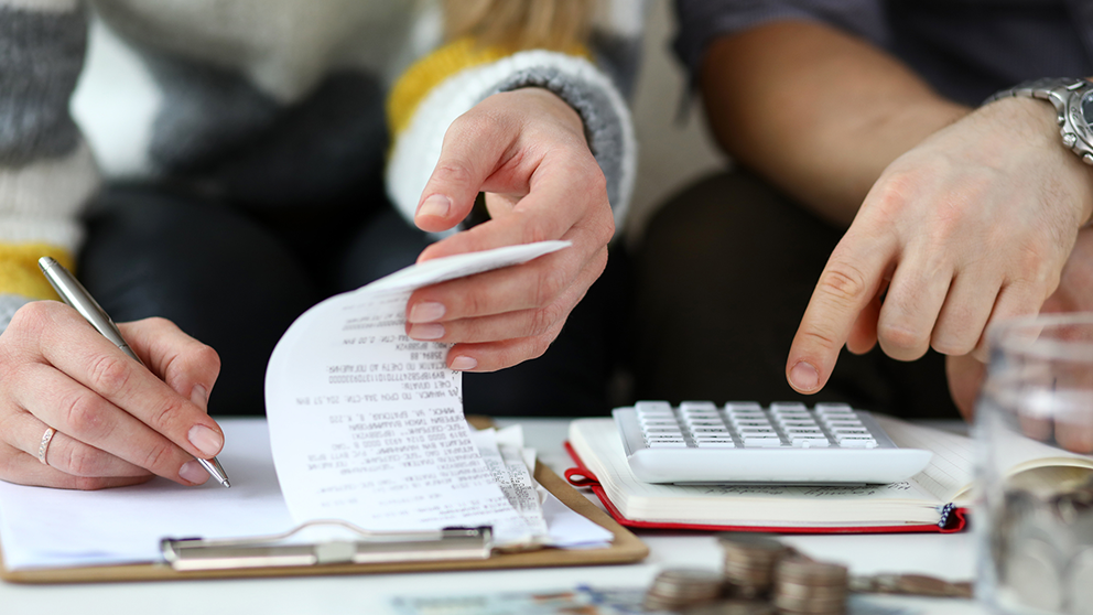 Couple looking over finances.