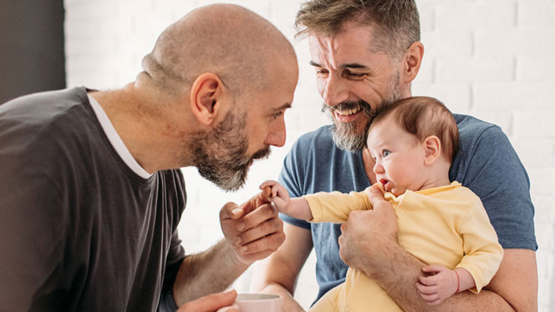 Family says good morning to new baby.